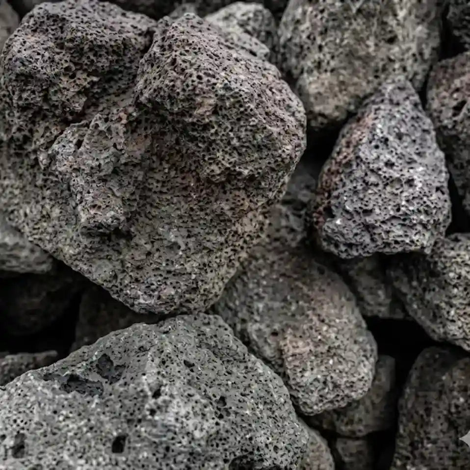 Close-up of dark gray volcanic rocks with rough texture