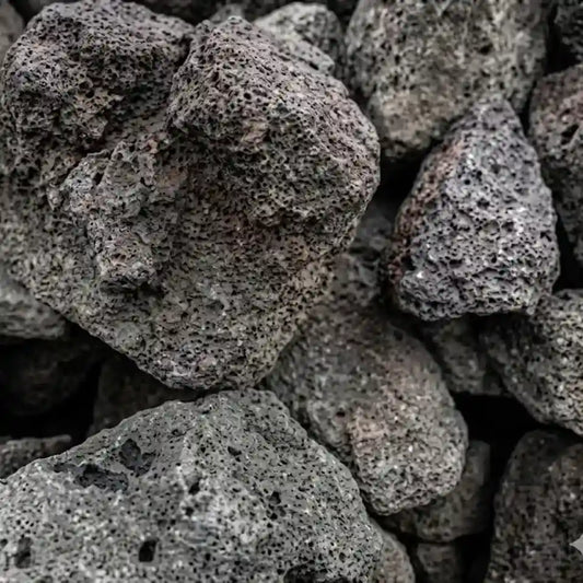 Close-up of dark gray volcanic rocks with rough texture