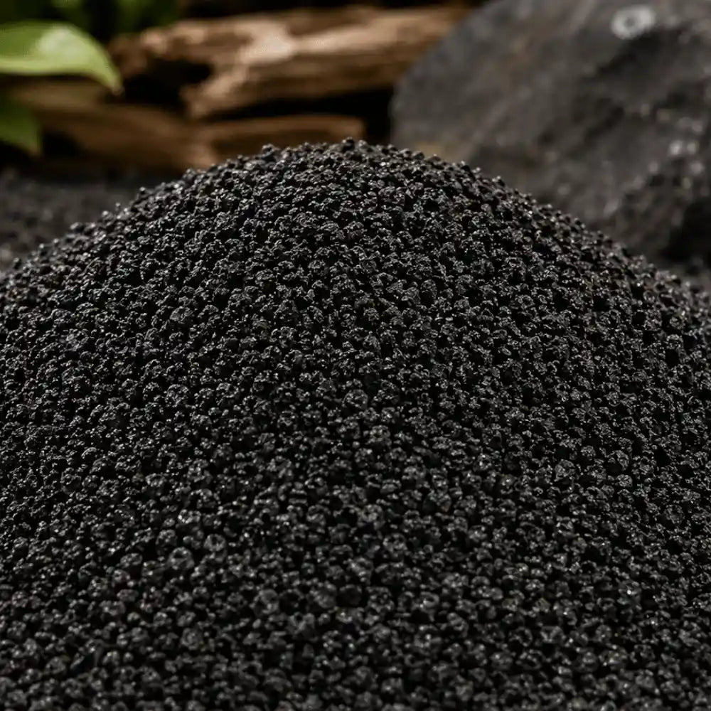 Close-up of a pile of dark soil or compost